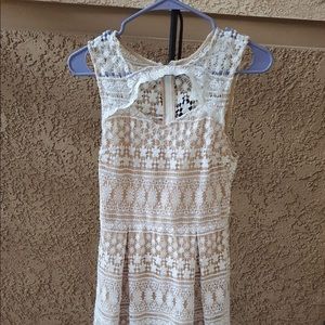 A very cute and classy lace dress from a boutique shop.